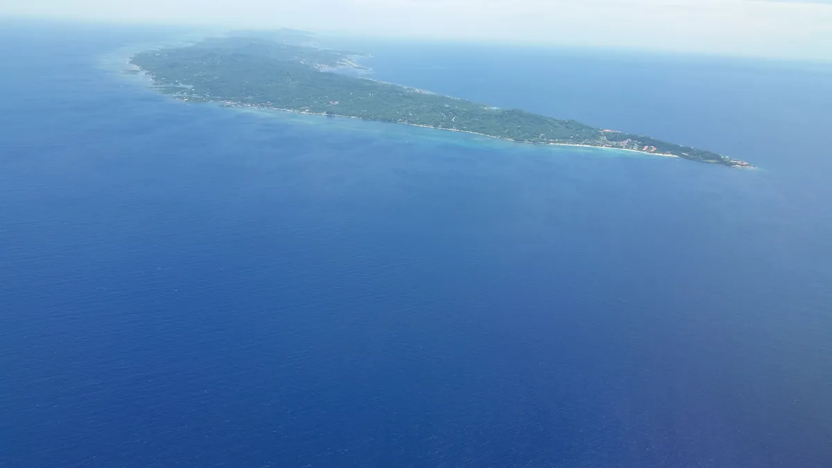 Roatan 5-Hour West Bay Beach Break and Monkey and Sloth Sanctuary