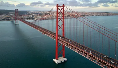 Lisbon Sunset Catamaran Boat Tour with Music and Drinks