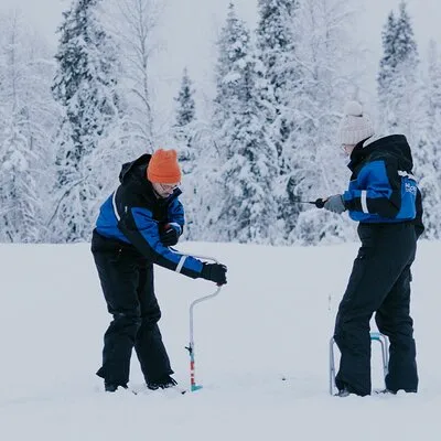 Ice Fishing by Snowmobile in Levi