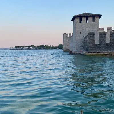 Sup experience with sightseeing tour in Sirmione Lake Garda