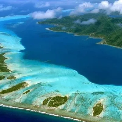 Private flight, in a light plane over the Polynesian motus from Raiatea