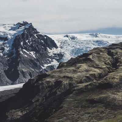 Airplane flight over glacier lagoons and Iceland's highest peak