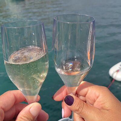 Sunset aperitif on a sailing boat in Alghero