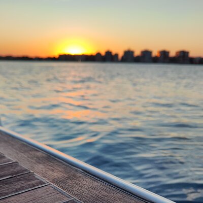Sailing with sunset and swimming in the sea