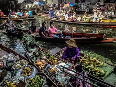 Bangkok Private Tour to Floating and Railway Market with Optional Erawan Waterfall and River Kwai Bridge