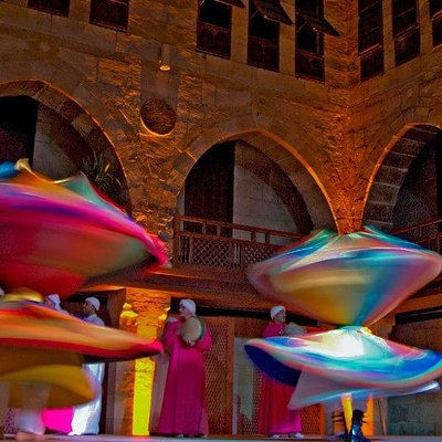 Cairo by night including Tanoura Show at Wikalet Al Ghouri Khan El Khalili Tahrir Square