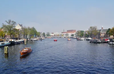 Amsterdam 1-Hour Saloon Boat Cruise with Unlimited Drinks and Bite Option